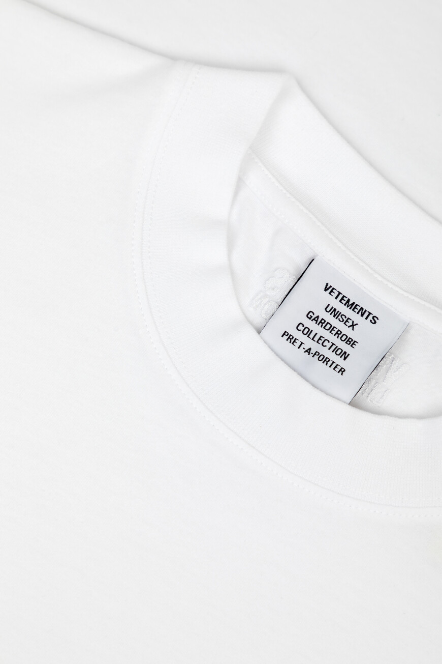 футболка  UA66TR735W 1000 WHITE на официальном сайте