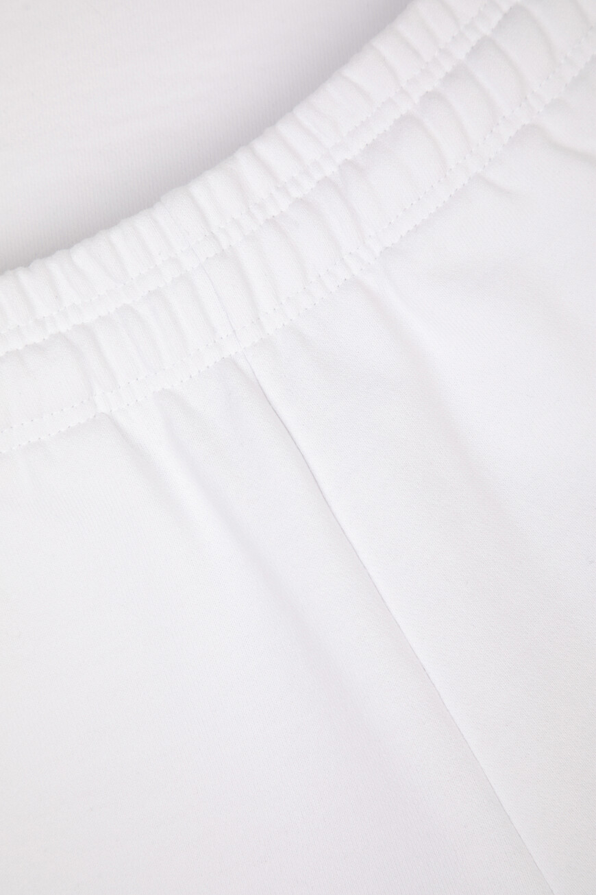 брюки  модель из лимитированной коллекции UA66SP630W 1302 WHITE по распродаже