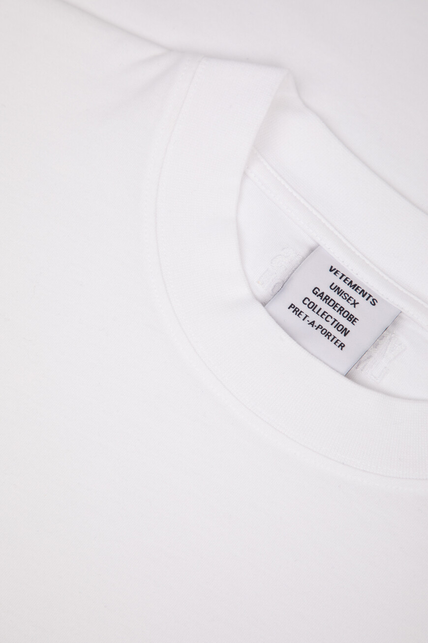 футболка  модель из эксклюзивной коллекции UA66TR630W 1000 WHITE на официальном сайте